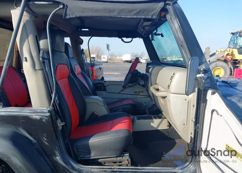 2003 Jeep Wrangler Sahara z USA, uszkodzony, nr VIN 1J4FA59S33P327992